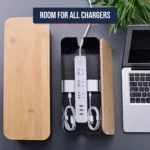 Cable management box open showing power strip and chargers stored inside