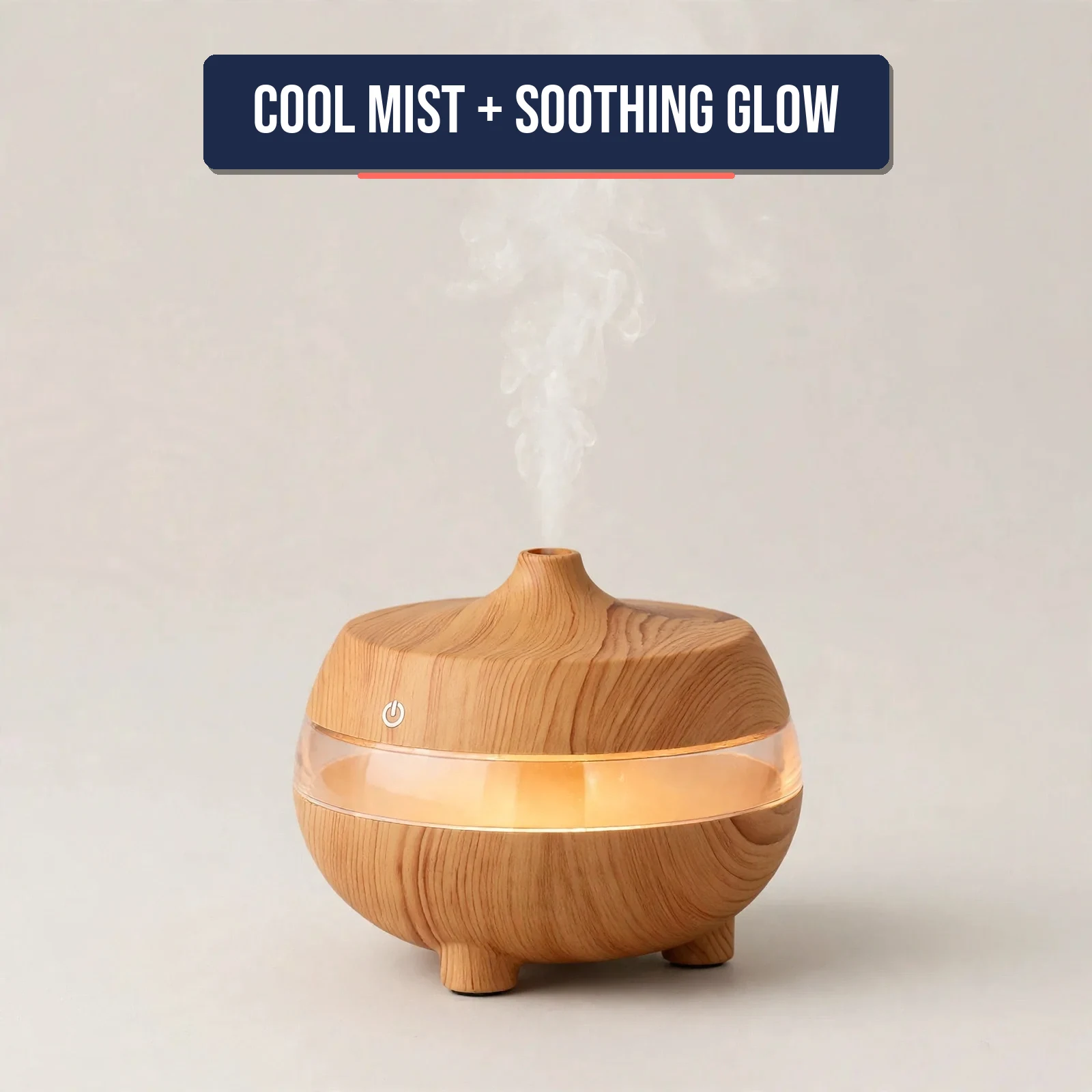 Angled view of the essential oil diffuser glowing with LED light and mist