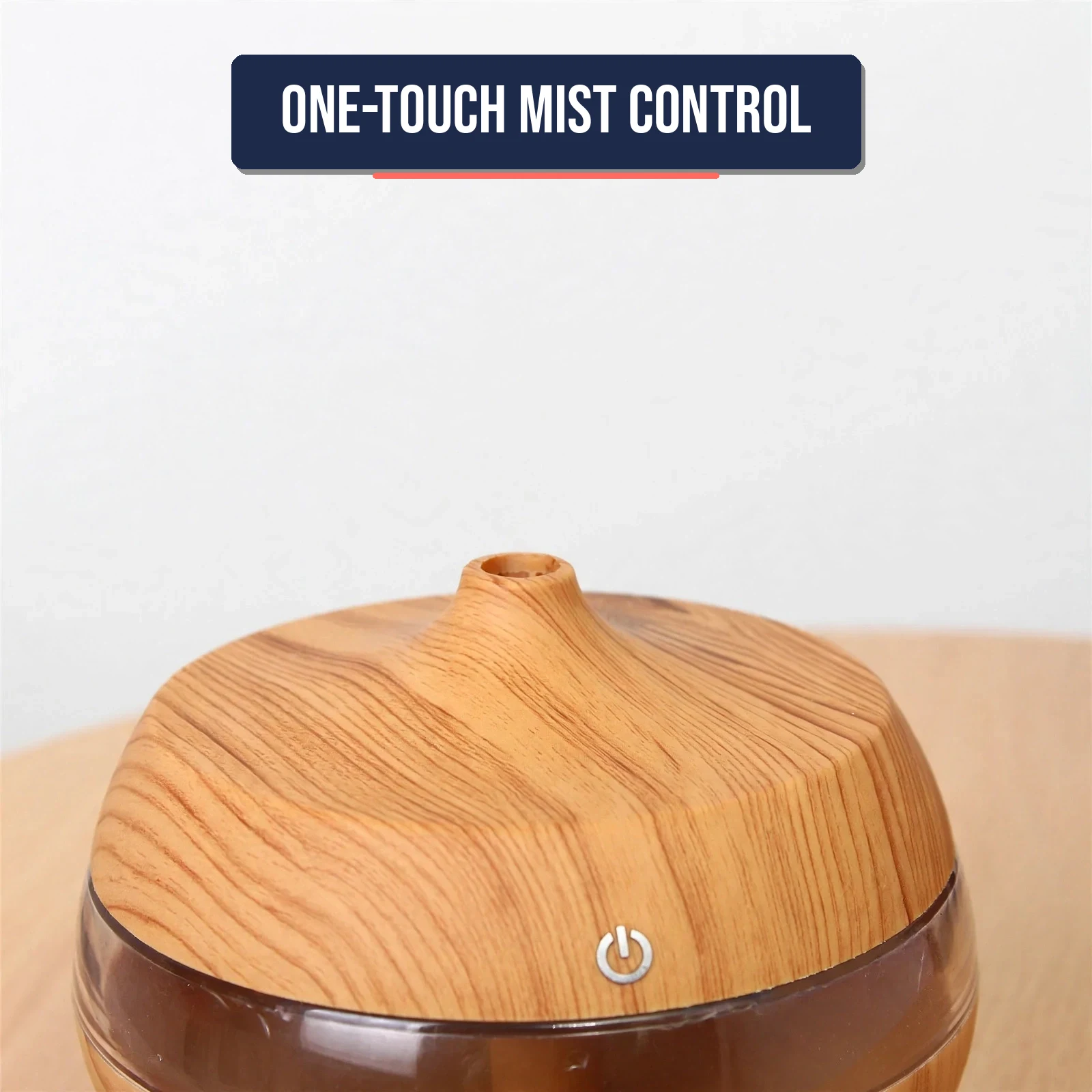 Close-up of the mist outlet and power button on the diffuser lid