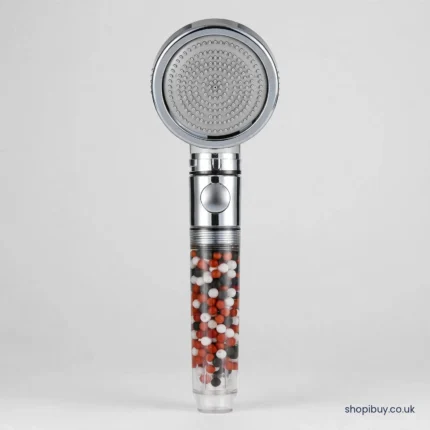 High-pressure filtered shower head with chrome rim and mineral bead filter handle - front view