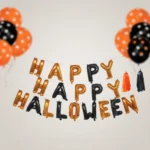 Gold HAPPY HALLOWEEN letter balloons close-up