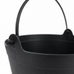 Close-up of the cauldron bucket handle attachment