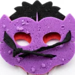 Close-up of the elasticated band and eye holes on a Halloween foam mask