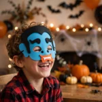 Child wearing the blue vampire Halloween foam mask at a party