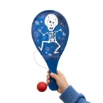 Halloween paddle bat held in hand showing scale