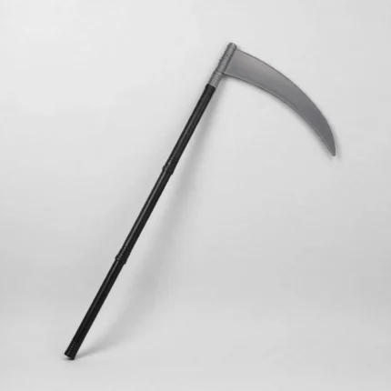 Halloween scythe toy with silver blade at three-quarter angle showing handle sections