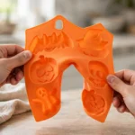 Halloween silicone mould flexed in hands to show flexibility