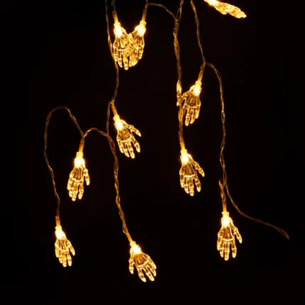 Halloween skeleton hand LED string lights glowing, front view