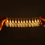 Skeleton hand LED string lights held in hand to show the 2 metre length