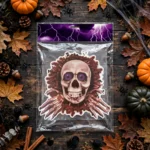 Flat lay of the Halloween skull toilet seat decal with spooky decorations