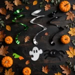 Flat lay of the three Halloween spiral decorations with cutouts