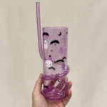 Hand holding the Halloween spiral straw tumbler showing its size