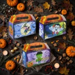 Three large Halloween treat boxes in witch, vampire and Frankenstein designs