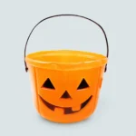 Orange Halloween trick or treat bucket for kids with printed pumpkin face, front view
