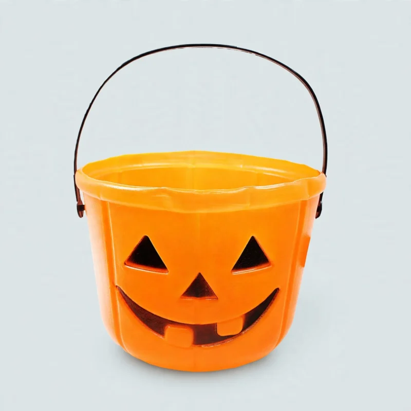 Orange Halloween trick or treat bucket for kids with printed pumpkin face, front view