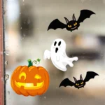 Close-up of pumpkin, ghost and bat window sticker designs
