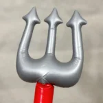 Close-up of the silver trident fork head of the inflatable devils fork