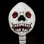 Close-up of the inflatable skeleton face with red eyes