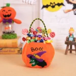 Orange Halloween trick or treat bag filled with colourful wrapped sweets