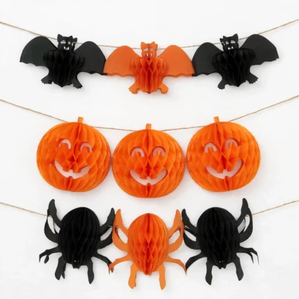 Paper Halloween garland with bats, pumpkins and spiders, front view