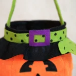 Close-up of the witch hat collar on the pumpkin candy tote bag