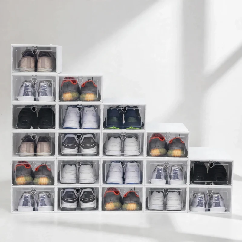 Shoe storage boxes 6-pack - white stackable boxes with clear doors and trainers inside, front view