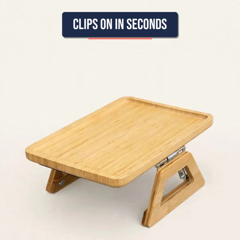 Angled view of the bamboo sofa arm tray showing raised edges