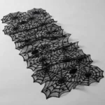 Spider web lace table runner at an angle showing drape