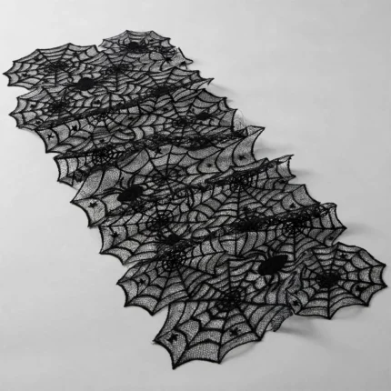 Spider web lace table runner at an angle showing drape