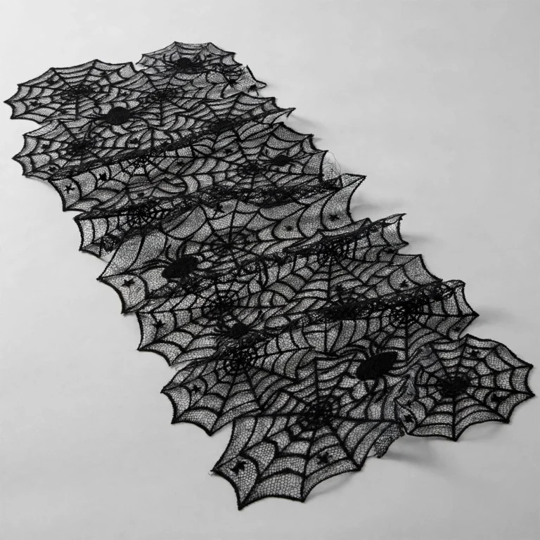 Spider web lace table runner at an angle showing drape