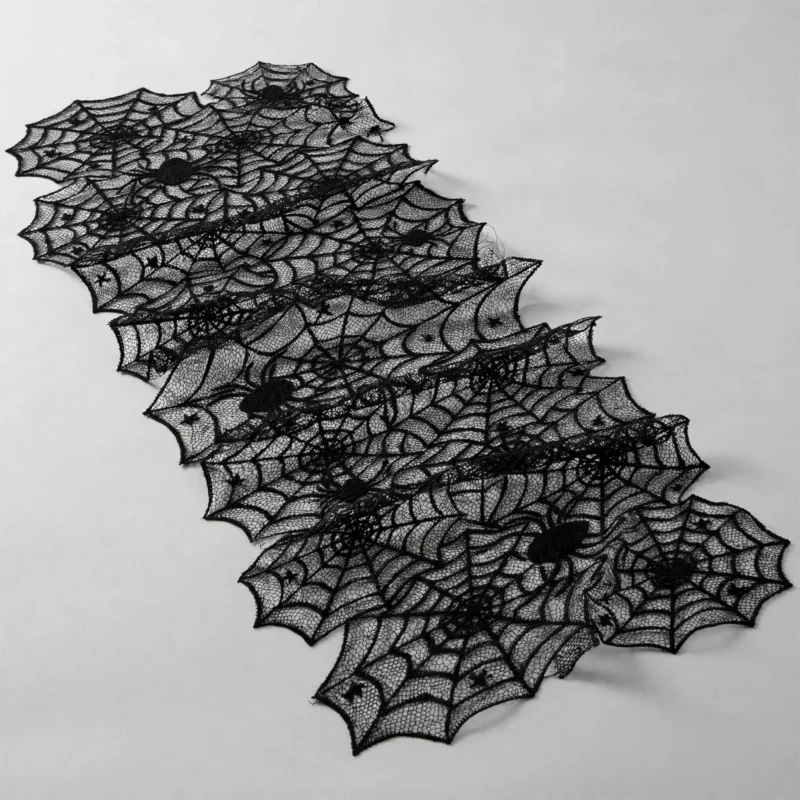 Spider web lace table runner at an angle showing drape