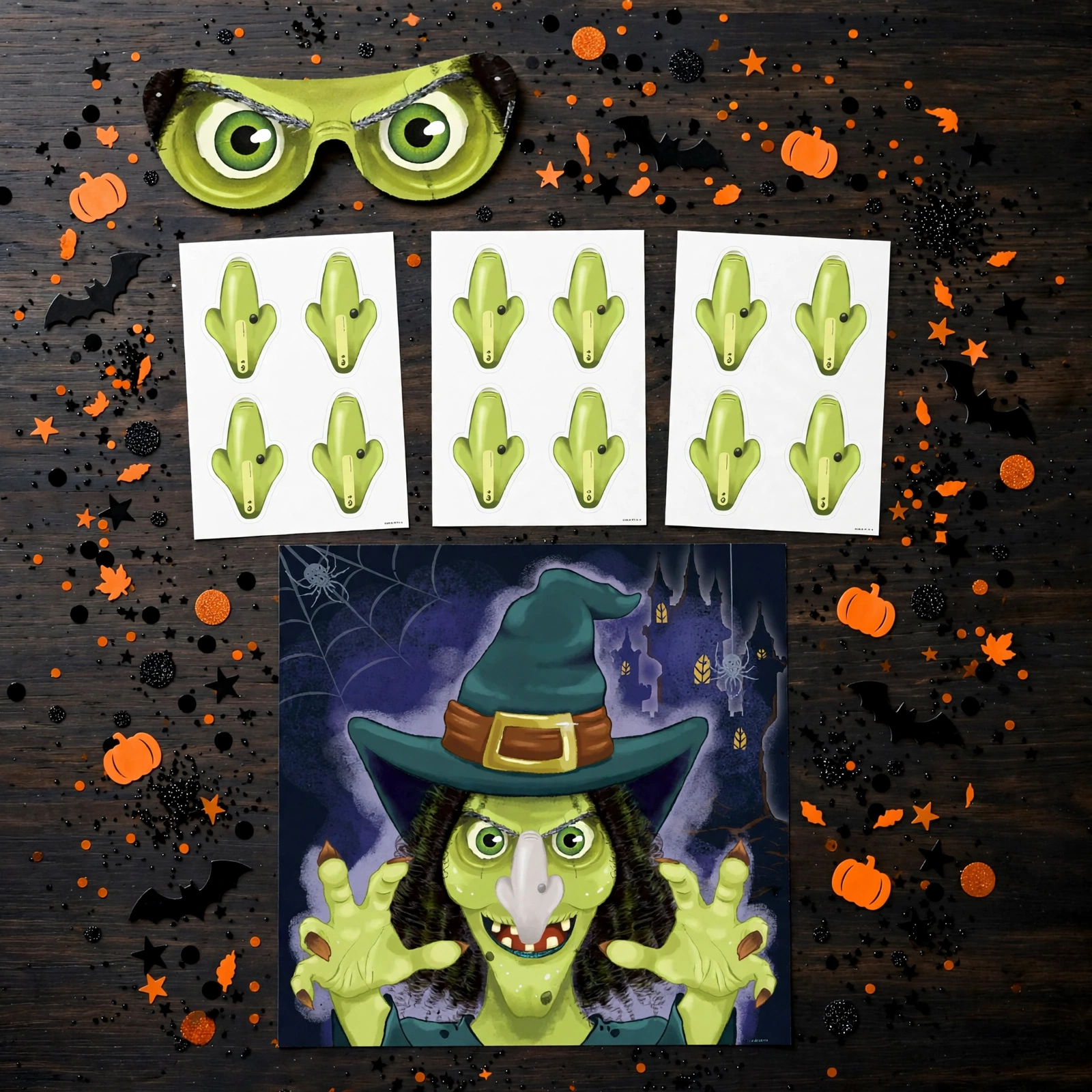 Flat lay of the stick the nose on the witch game pieces