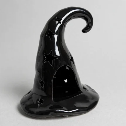 Ceramic witch hat tealight holder, three-quarter angle view
