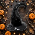 Flat lay of the witch hat tealight holder with autumn decorations